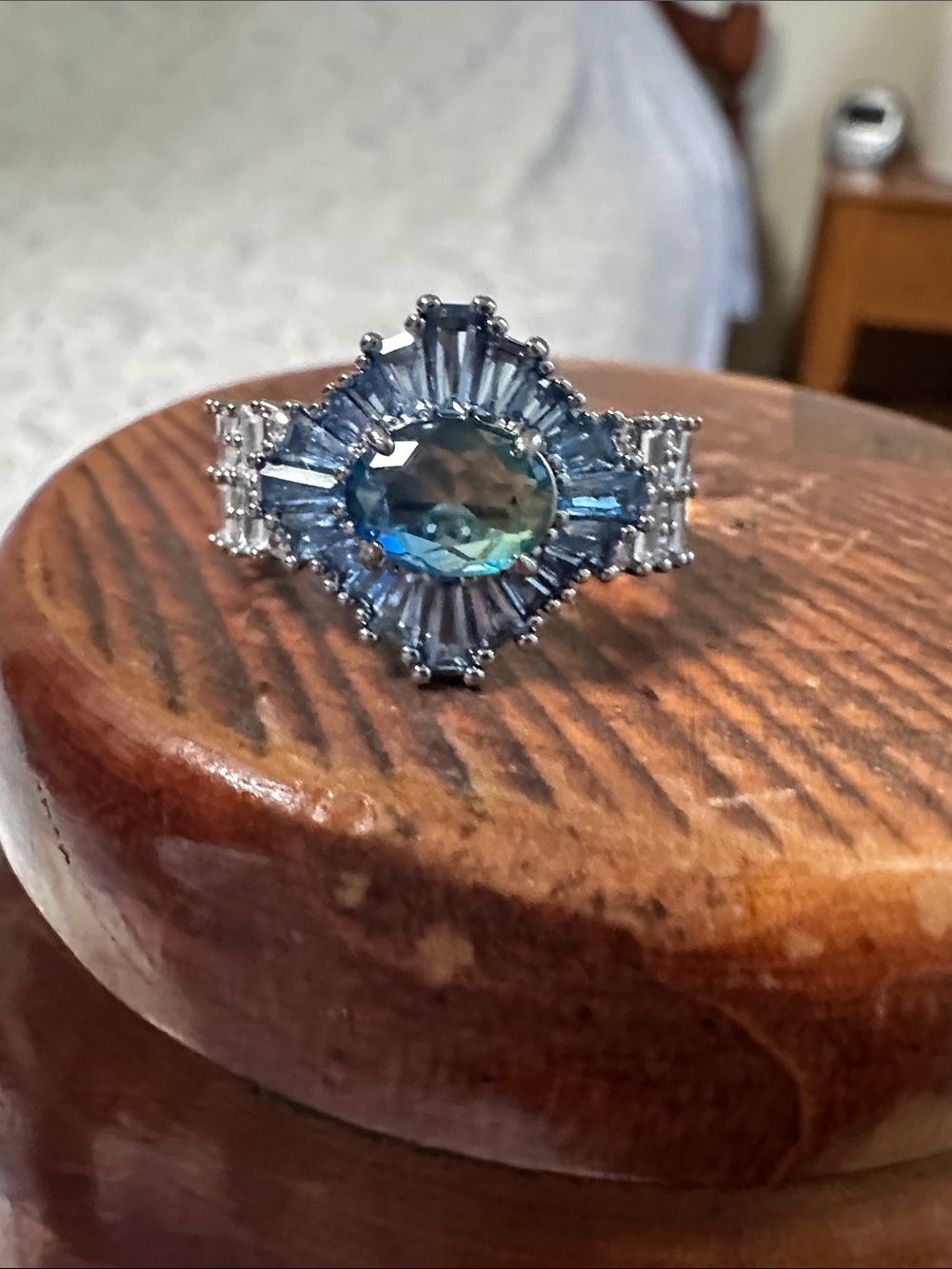 Blue Mystic Topaz Halo Ring with Baguette Accents